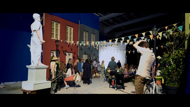 Video Reference: Building, Sculpture, Entertainment, Art, Statue, Leisure, Tire, Event, City, Performing arts