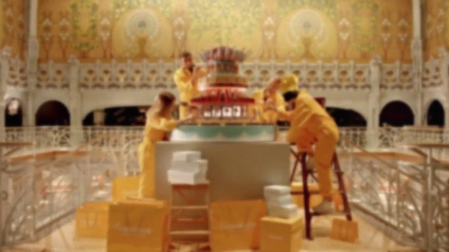 Video Reference: Yellow, Toy, Event, Font, Symmetry, Holy places, Temple, Wood, Metal, Place of worship