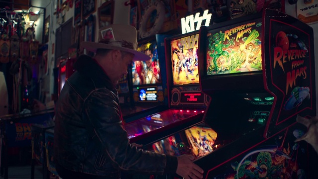 Video Reference: Gamer, Recreation room, Slot machine, Arcade game, Casino, Recreation, Machine, Indoor games and sports, Video game arcade cabinet, Darkness