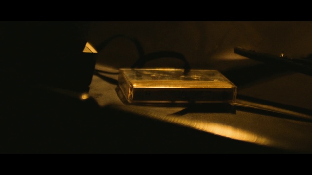 Video Reference: Amber, Automotive lighting, Office equipment, Gas, Tints and shades, Wood, Font, Darkness, Automotive design, Eyewear