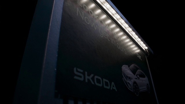 Video Reference: Hood, Automotive lighting, Vehicle, Automotive design, Motor vehicle, Automotive exterior, Billboard, Headlamp, Cloud, Font