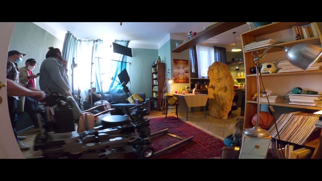 Video Reference: Furniture, Table, Interior design, Chair, Living room, Coffee table, Event, Flooring, Houseplant, Leisure