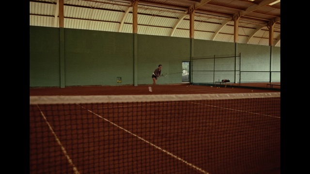 Video Reference: Building, Sports equipment, Field house, Wood, Orange, Door, Mesh, Flooring, Tennis court, Floor