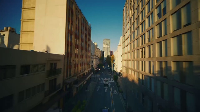 Video Reference: Building, Window, Sky, Tower block, Sunlight, Urban design, Dusk, Road surface, Condominium, Residential area