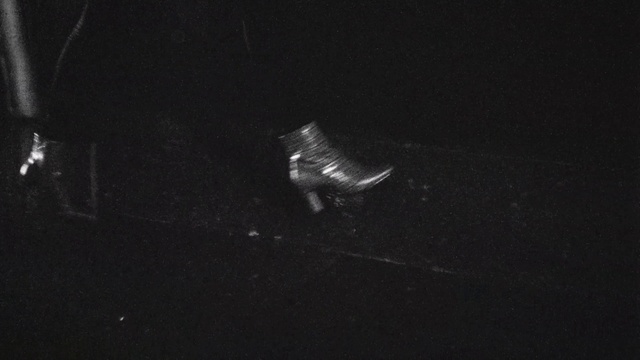 Video Reference: Flash photography, Darkness, Event, Astronomical object, Midnight, Science, Font, Fashion accessory, Asphalt, Composite material