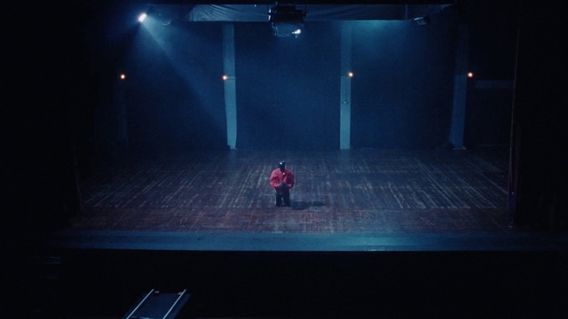 Video Reference: Entertainment, Performing arts, Electric blue, Event, Display device, Darkness, Stage, Space, Performance art, Room