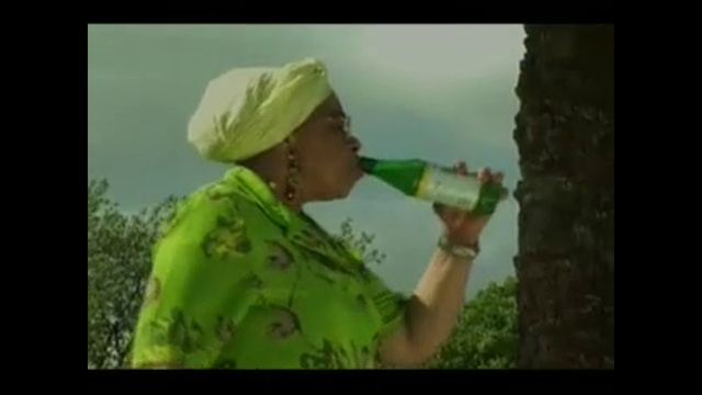 Video Reference: Bottle, Gesture, Happy, Drink, Fun, Cloud, Event, Cap, Grassland, Photo caption