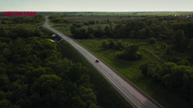 Video Reference: Ecoregion, Sky, Car, Natural environment, Road surface, Tree, Plant, Natural landscape, Asphalt, Land lot