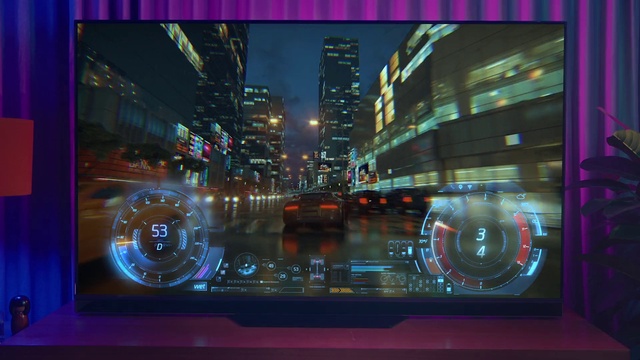 Video Reference: Building, Automotive lighting, Font, Cityscape, Electricity, City, Metropolitan area, Metropolis, Electronic device, Display device