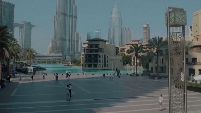 Video Reference: Sky, Building, Skyscraper, Daytime, Tower, Condominium, Urban design, Tower block, Tree, Cityscape