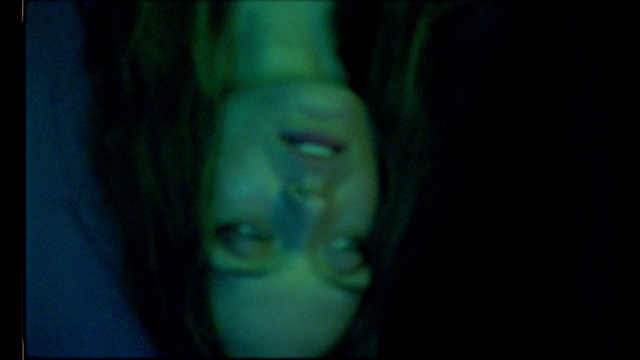 Video Reference: Eyelash, Gesture, Underwater, Eyewear, Electric blue, Personal protective equipment, Darkness, Fictional character, Transparent material, Chest