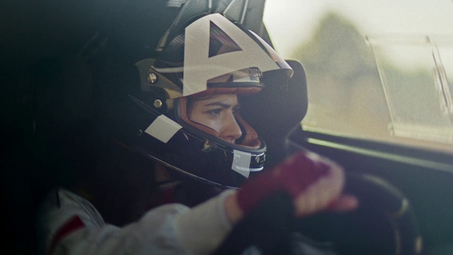 Video Reference: Helmet, Hood, Gesture, Automotive design, Headgear, Automotive lighting, Automotive exterior, Personal protective equipment, Vehicle, Auto part