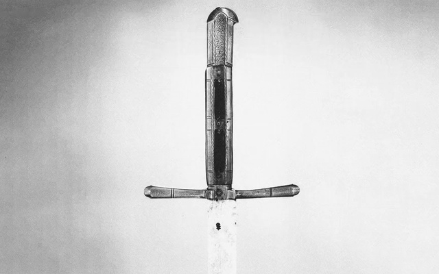 Video Reference: Cross, Symbol, Artifact, Wing, Fashion accessory, Metal, Nickel, Monochrome, Font, Titanium