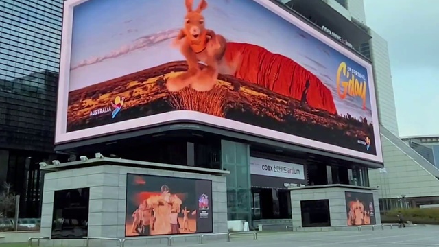 Video Reference: Building, Display device, Facade, Sky, Flat panel display, Electronic device, Technology, Advertising, Signage, Electronic signage