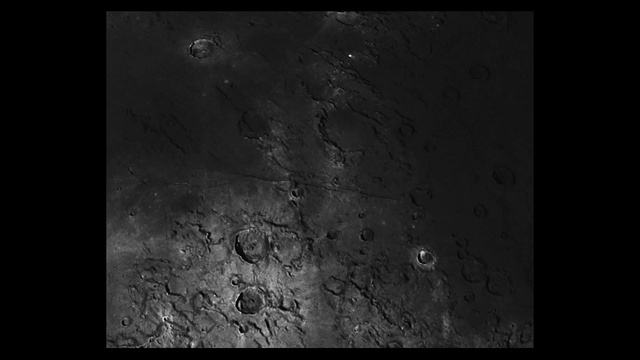 Video Reference: Atmosphere, Grey, Atmospheric phenomenon, Black-and-white, Sky, Astronomical object, Moon, Font, Science, Space
