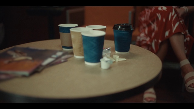 Video Reference: Table, Drinkware, Furniture, Cup, Liquid, Tableware, Electric blue, Desk, Cup, Plastic