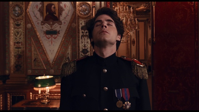 Video Reference: Flash photography, Military uniform, Military person, Beard, Non-commissioned officer, Darkness, Event, Facial hair, Font, Room