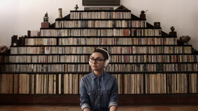 Video Reference: Property, Bookcase, Shelf, Vision care, Book, Publication, Human, Dress shirt, Temple, Sleeve