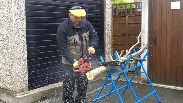 Video Reference: Workwear, Asphalt, Blue-collar worker, Cap, Wood, Recreation, Road surface, Power tool, Street artist, Construction worker