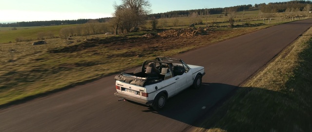 Video Reference: Wheel, Tire, Vehicle, Car, Sky, Plant, Hood, Automotive side-view mirror, Automotive tire, Vehicle registration plate