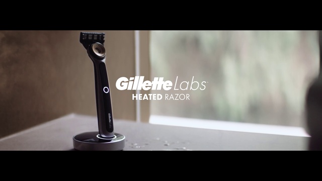 Video Reference: Font, Wood, Flash photography, Drinkware, Gadget, Audio equipment, Window, Glass, Communication Device, Automotive design