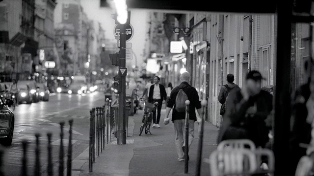 Video Reference: Bicycle, White, Light, Tire, Infrastructure, Black, Human, Road surface, Black-and-white, Street light