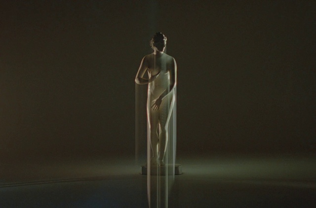 Video Reference: Sculpture, Statue, Art, Glass, Darkness, Event, Artifact, Monument, Balance, Visual arts