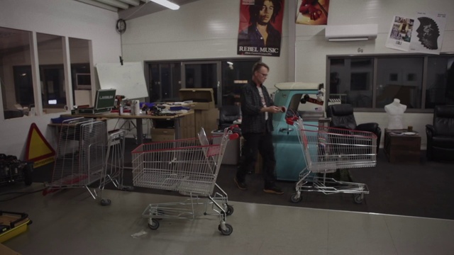 Video Reference: Tire, Wheel, Shopping cart, Product, Picture frame, Building, Cart, Service, Flooring, Customer