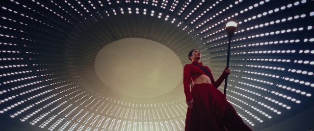 Video Reference: Light, Flash photography, Building, Audio equipment, Event, Symmetry, Performing arts, Circle, Entertainment, Magenta