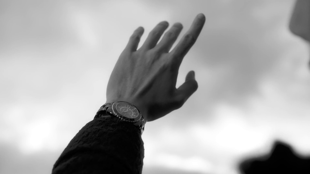 Video Reference: Cloud, Watch, Hand, Sky, Atmosphere, Arm, Human body, People in nature, Flash photography, Gesture