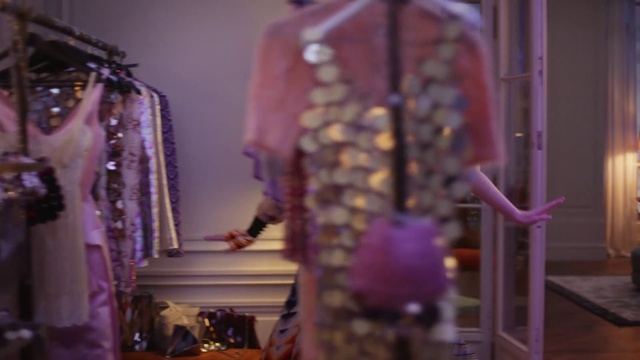 Video Reference: Purple, Sleeve, Textile, Violet, Fashion design, Retail, Boutique, Magenta, Formal wear, Event