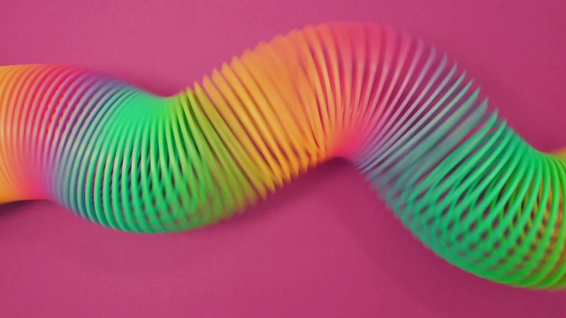Video Reference: Sleeve, Pink, Magenta, T-shirt, Electric blue, Nail, Font, Pattern, Close-up, Fashion accessory
