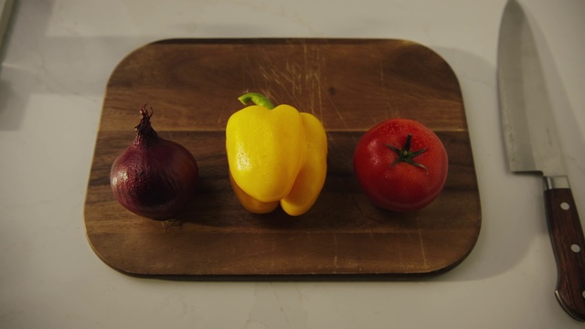 Video Reference: Food, Yellow pepper, Bell pepper, Ingredient, Dishware, Natural foods, Orange, Green bell pepper, Plant, Staple food