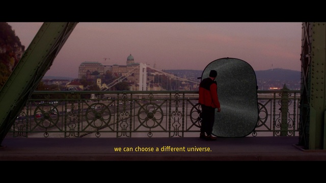 Video Reference: Sky, Travel, Tints and shades, City, Horizon, Metal, Leisure, Reflection, Pedestrian, Lake