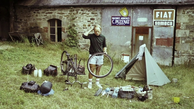 Video Reference: Wheel, Bicycle, Window, Plant, Tire, Bicycle wheel, Building, Grass, Bicycle tire, House