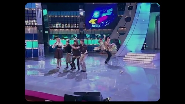 Video Reference: Chair, Entertainment, Performing arts, Television set, Gadget, Flat panel display, Television program, Visual effect lighting, Display device, Projection screen