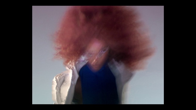 Video Reference: Hair, Flash photography, Gesture, Entertainment, Smoke, Event, Font, Magenta, Performance art, Darkness