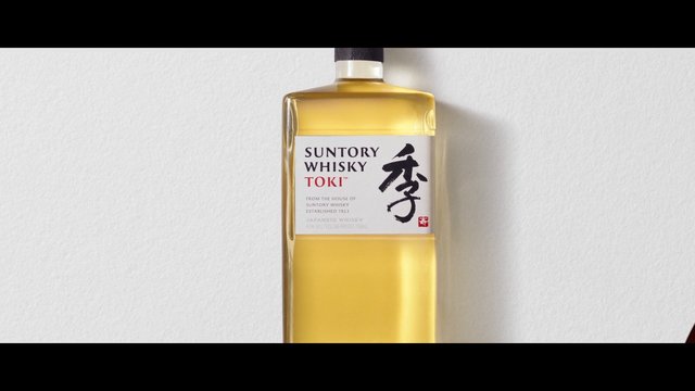 Video Reference: whisky, bottle, suntory, japanese whisky, alcohol, spirits, liquor, product shot, label, glass bottle, golden liquid, minimal background, packaging, beverage