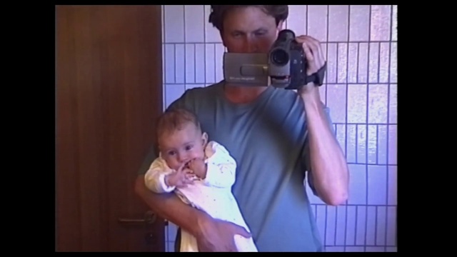 Video Reference: Hand, Arm, Muscle, Mouth, Flash photography, Photographer, Vision care, Gesture, Digital camera, Reflex camera