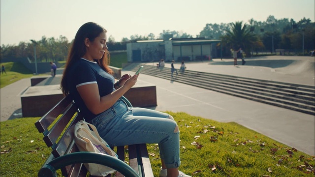 Video Reference: Jeans, Sky, Plant, Eyewear, Tree, People in nature, Sunlight, Travel, Thigh, Happy