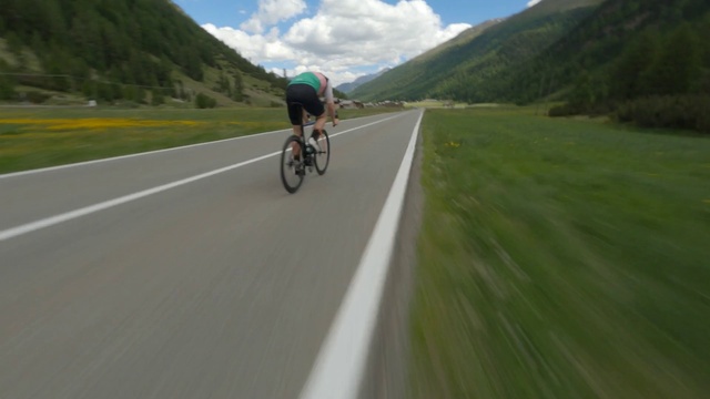 Video Reference: Bicycle, Bicycles--Equipment and supplies, Sky, Cloud, Wheel, Sports equipment, Mountain, Asphalt, Bicycle frame, Road surface