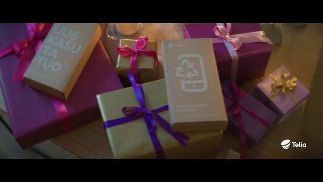 Video Reference: Rectangle, Purple, Gift wrapping, Pink, Party supply, Material property, Ribbon, Font, Magenta, Present