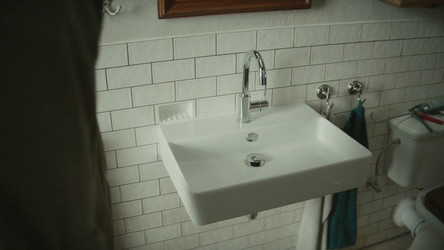 Video Reference: Brown, Tap, Sink, Plumbing fixture, Bathroom sink, Bathroom, Fluid, Interior design, Flooring, Wood