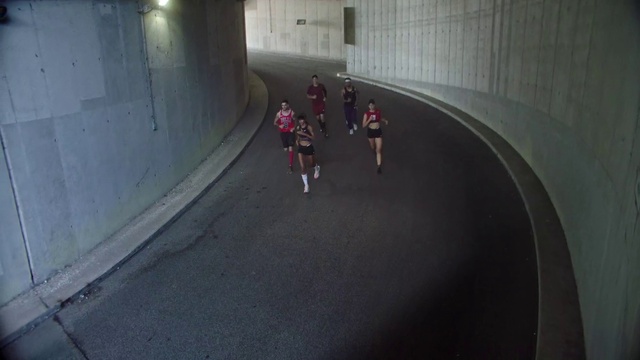 Video Reference: Asphalt, Road surface, Running, Sports, Racing, Road, Recreation, Tunnel, Concrete, Competition event