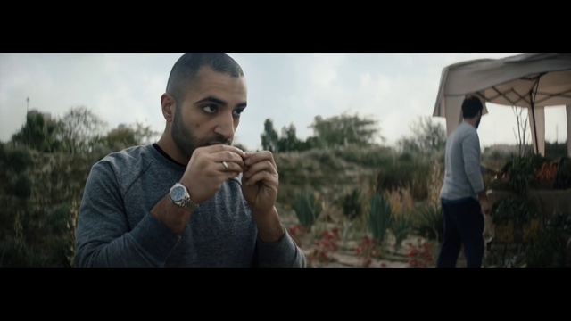 Video Reference: Watch, Mouth, Flash photography, Temple, Sky, Gesture, Plant, Adaptation, Tree, Beard