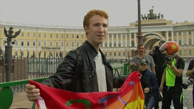 Video Reference: Outerwear, Building, Helmet, Sky, Window, Balloon, Leisure, Jacket, People, Travel