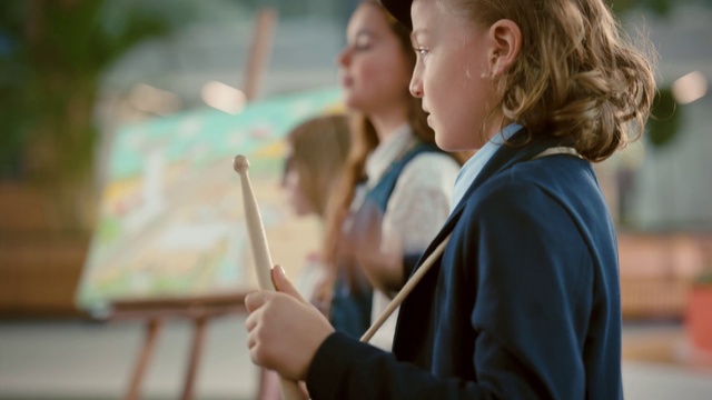 Video Reference: Hand, Gesture, Leisure, Happy, Street fashion, Grass, Event, Child, Fun, Office supplies