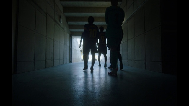 Video Reference: Shorts, Flash photography, Gesture, Grey, Floor, Flooring, Tints and shades, Art, Human leg, Symmetry