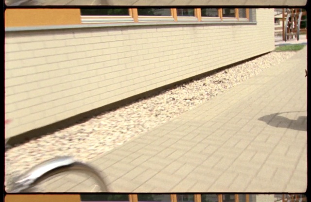 Video Reference: Building, Wood, Road surface, Flooring, Floor, Rectangle, Asphalt, Line, Font, Sidewalk