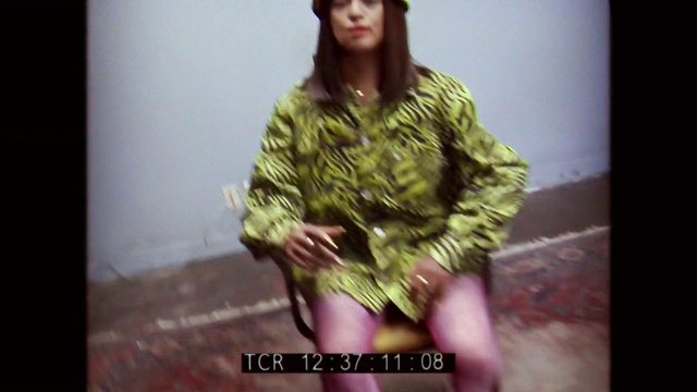 Video Reference: Camouflage, Sleeve, Military camouflage, Waist, Thigh, Fashion design, Magenta, Beauty, Formal wear, Event